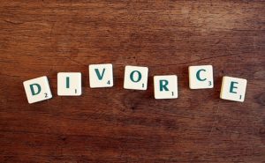 divorce spelled out in scrabble lett